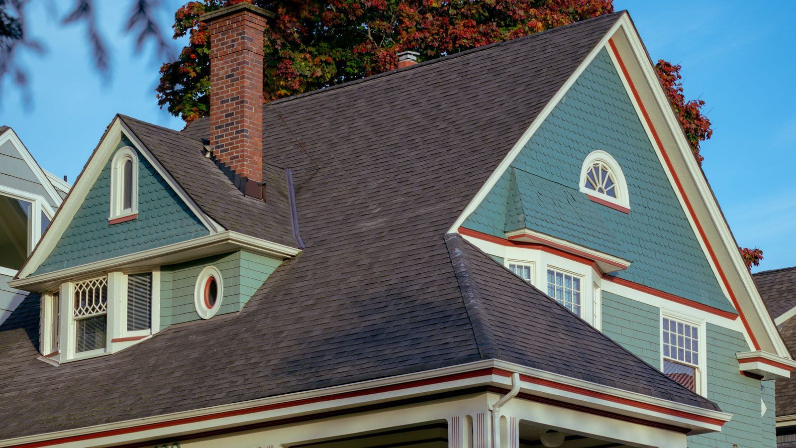 Craftsman-style home on a tree-lined residential street in the Seattle area